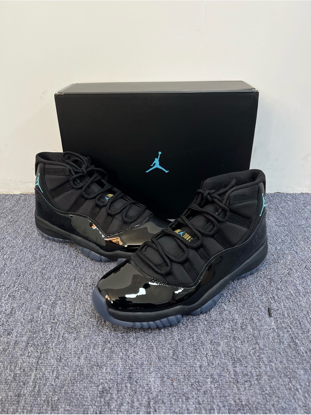 Jordan 11 Retro Black with Teal Accents